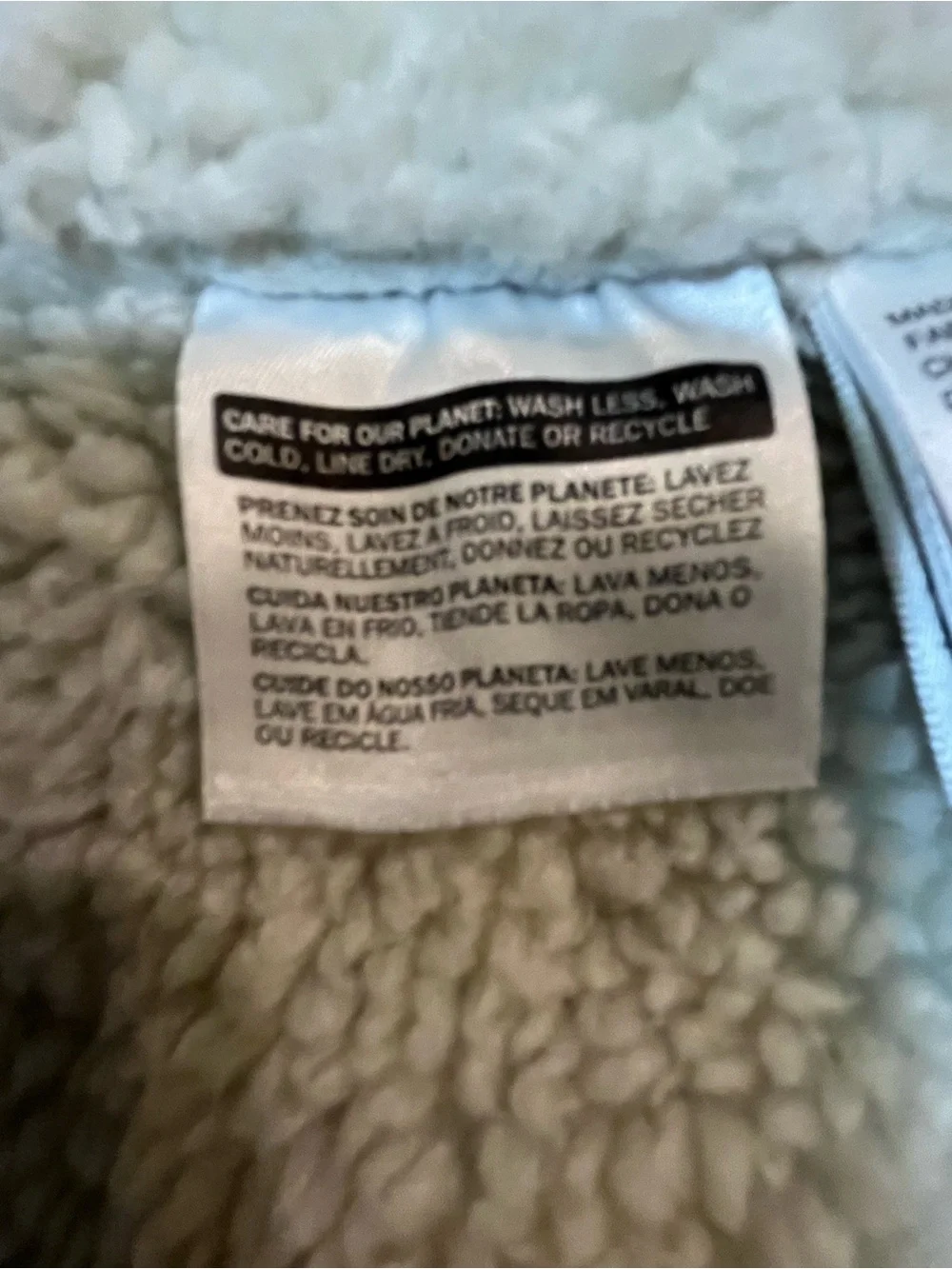 Levi's Light Blue Denim Trucker Jacket with Cream Sherpa Lining